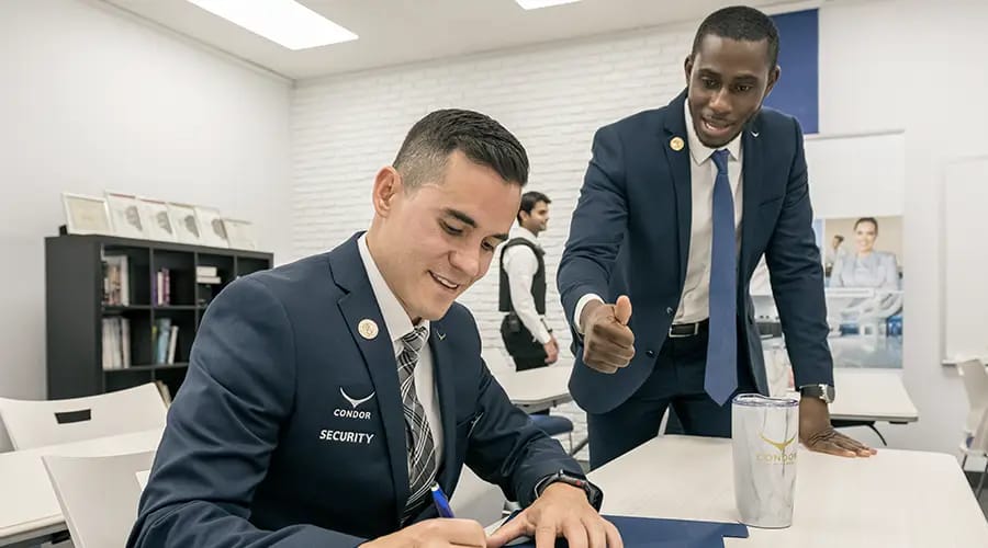 a group of security guards in suits About Condor Security (Security Guard Jobs) (Event Security Services)