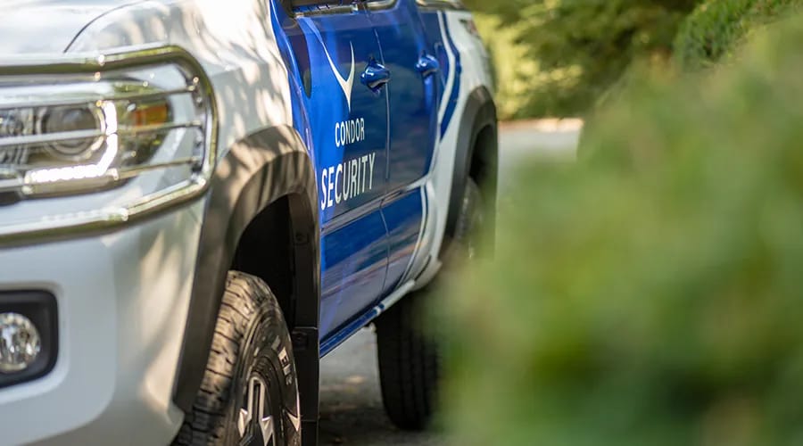 Close-up of a blue and white truck-Condor Security (Secure) (Security Services)