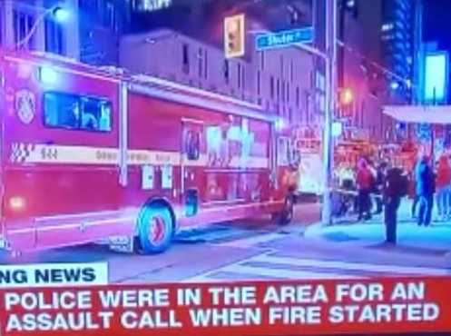 Police in area for assault when fire started firetrucks on street
