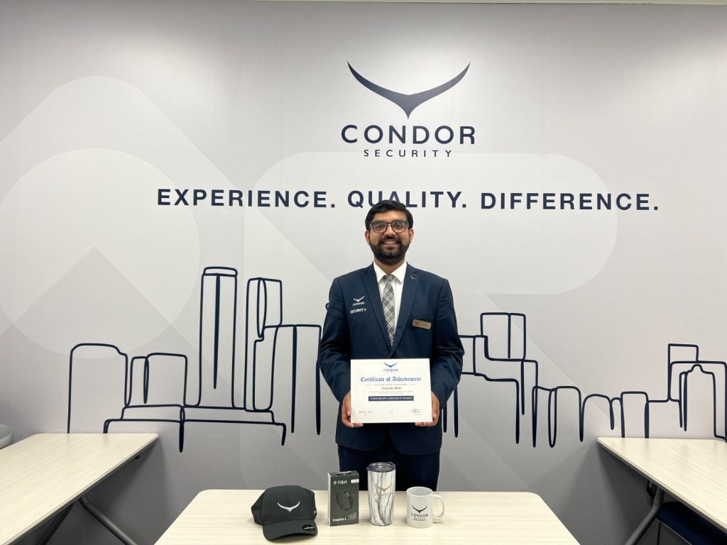 Certificate presentation with branded merchandise.